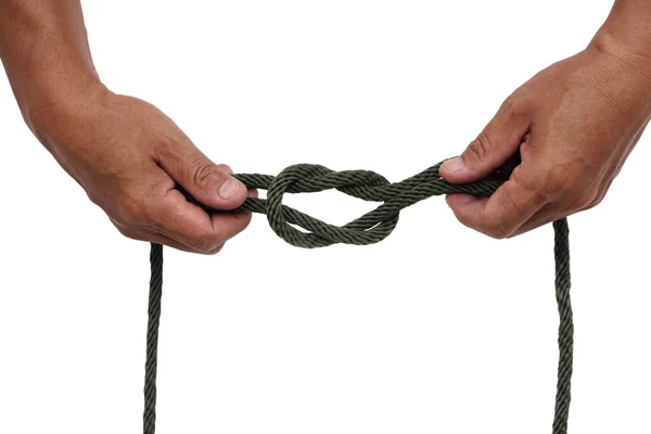 Closeup Hands Demonstrates How Tie Knot Rope Isolated White Background — стоковое фото