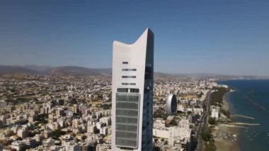 Embankment of Limassol in Cyprus. Modern architecture and old town. Skyscrapers.