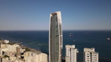 Embankment of Limassol in Cyprus. Modern architecture and old town. Skyscrapers.