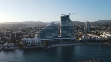 Embankment of Limassol in Cyprus. Modern architecture and old town. Skyscrapers.