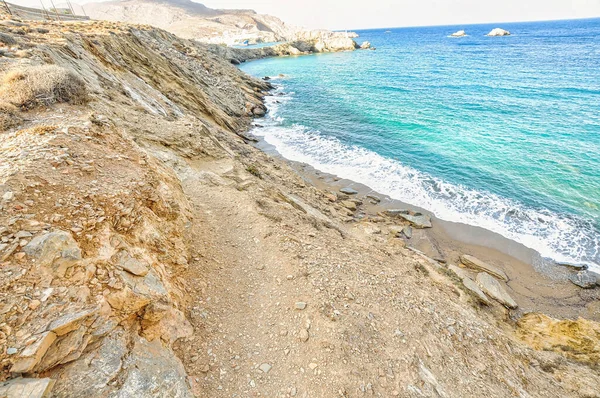 夏季在希腊爱琴海弗列冈多斯岛庞塔基海滩的奇观异彩纷呈 图库图片