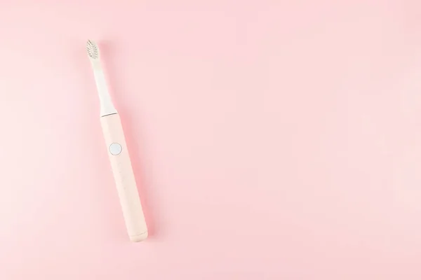 Neue Moderne Ultraschallzahnbürste Kiefermodell Und Zahnpflegemittel Auf Rosa Pastellhintergrund Mundhygiene — Stockfoto