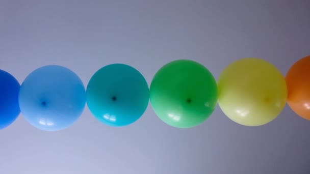 Rainbow balloons decorations for birthday party. Pride word. LGBT rights and gender equality — Wideo stockowe