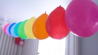 Rainbow balloons decorations for birthday party. Pride word. LGBT rights and gender equality
