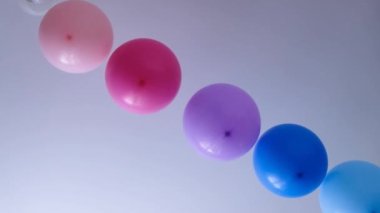 Rainbow balloons decorations for birthday party. Pride word. LGBT rights and gender equality