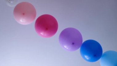 Rainbow balloons decorations for birthday party. Pride word. LGBT rights and gender equality
