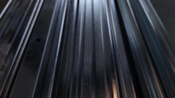 Metal profiles. Stack of stainless steel pipes in warehouse. Rolled metal products. Economic Metals list prices index. Financial crisis. Wall building parts. — Vídeo de stock