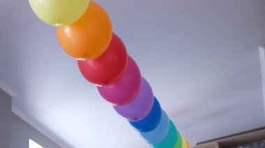 Rainbow balloons decorations for birthday party. Pride word. LGBT rights and gender equality