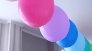 Rainbow balloons decorations for birthday party. Pride word. LGBT rights and gender equality