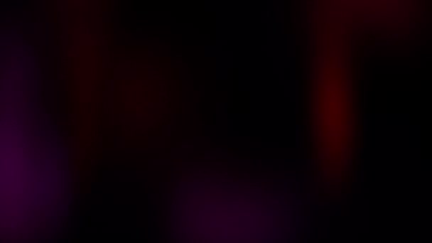 プロジェクト上のオーバーレイのための抽象的なデフォーカス赤とピンクの光漏れグラデーション背景ループ ガラス越しの絶景 — ストック動画