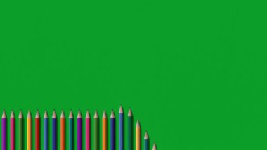A set of colored pencils appearing in turn against a background of green paper. Video animation for your business concept. School and education, office