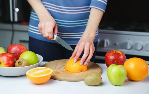 Young Girl Cuts Orange Making Fresh Juice Healthy Food Concept — 스톡 사진