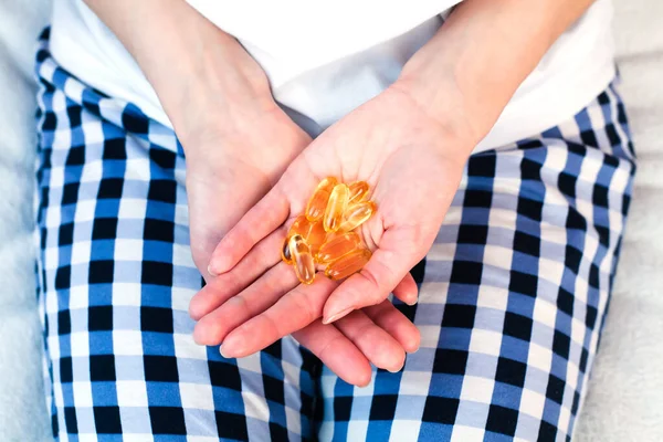 Young Woman Holds Handful Capsules Omega Fatty Acid Hands Taking — Fotografie, imagine de stoc