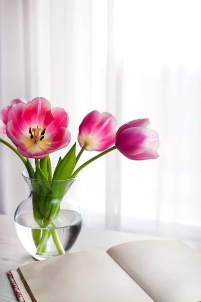 Bouquet Pink Tulips Vase Open Book Lie Table Selective Focus — Zdjęcie stockowe