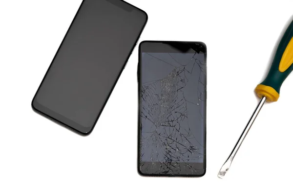 Modern New Smartphone Old Broken Close Black Isolated White Background — Stock Photo, Image