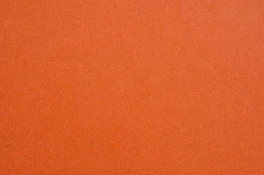 Düzen, kolaj ve bardak altlığı için kağıt kumaş kumaşlı turuncu arkaplan. Saf renk.