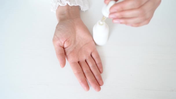 Hand Woman Cleaning Her Hand Alcohol Gel Liquid Clear Bottle — Stockvideo