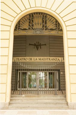 Seville, Spain, February 15 2021: Main entrance door to the Maestranza Theater. clipart