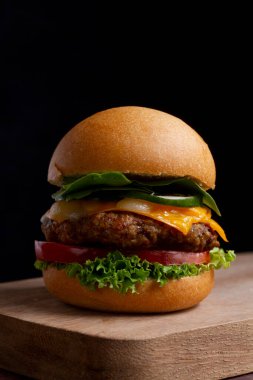A picture of a delicious street food burger .