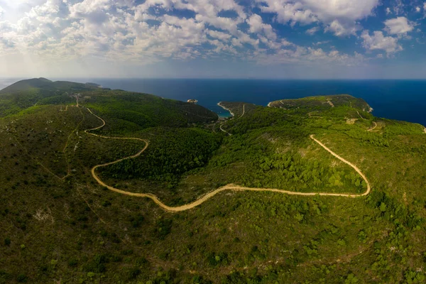  Mountain road on Bishevo island Croatia at sunny summer day. High quality photo