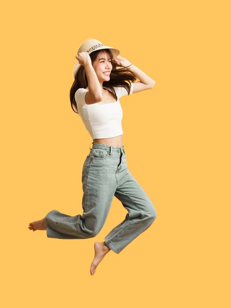 Happiness Asian Beautiful Woman Casual Lifestyle Jumping Isolated Yellow Background — ストック写真