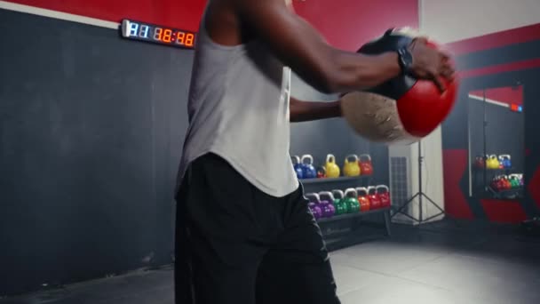 Medium Close Shot Black Man Athlete Exercising Swing Weight Ball — Stock Video