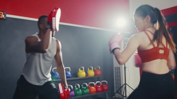 Asian Young Girl Having Boxing Exercise Black Man Coaching Gym — Stock Video