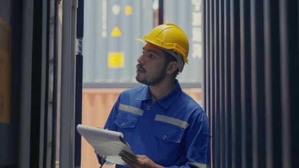 Medium Full Shot Asian Man Industrial Shipping Worker Checking Container — Vídeos de Stock