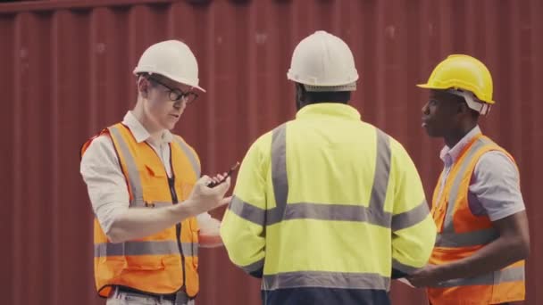 Medium Shot Foreman Industrial Shipping Worker Discuss Together Container Yard — Stockvideo