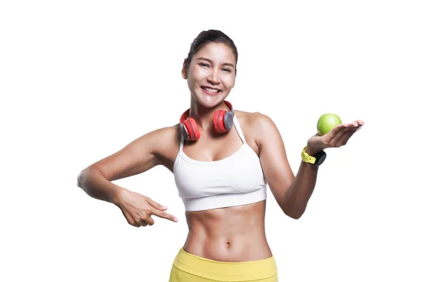 Mujer Asiática Sana Deportiva Sonriendo Mientras Sostiene Manzana Verde Señala —  Fotos de Stock