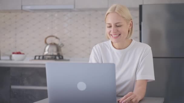 Smiling Young Blonde Woman Makes Checkout Finishes Online Purchase Bank — 图库视频影像