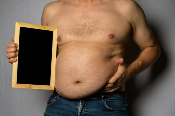 Overweight Shirtless Caucasian Man Standing Facing Front Holding Fat Blackboard — Stockfoto