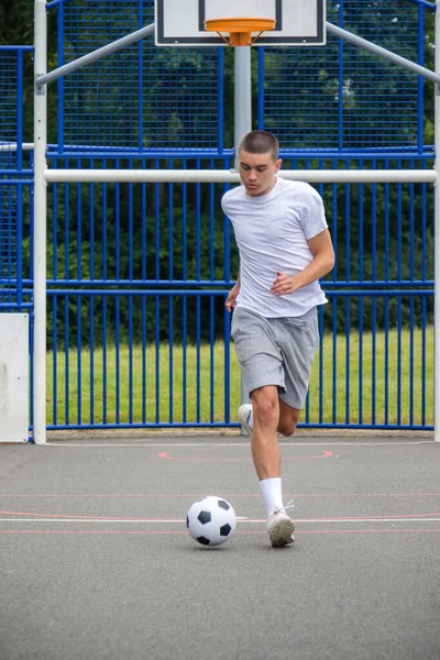 Nineteen Year Old Teenage Boy Playing Football Public Park — Fotografia de Stock