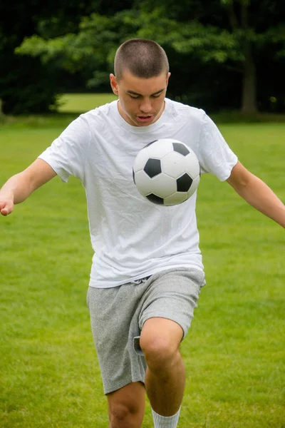 Nineteen Year Old Teenage Boy Playing Football Public Park — Fotografia de Stock
