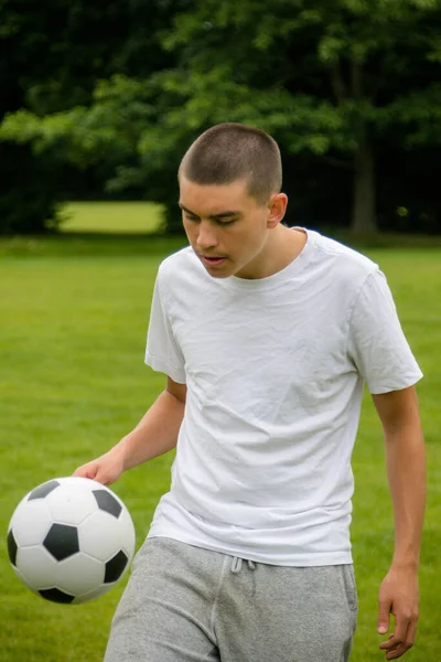 Nineteen Year Old Teenage Boy Playing Football Public Park — Stockfoto