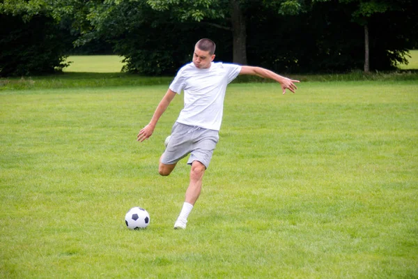 Nineteen Year Old Teenage Boy Playing Football Public Park — Fotografia de Stock