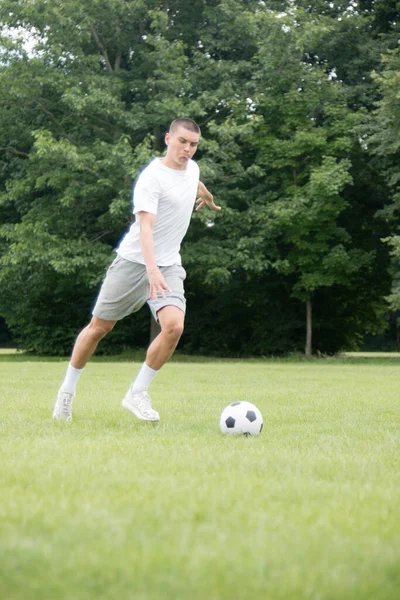 Nineteen Year Old Teenage Boy Playing Football Public Park — Fotografia de Stock