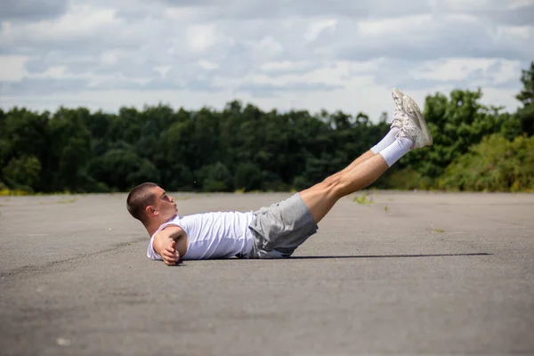 Nineteen Year Old Teenage Boy Doing Leg Raises Public Park — Stock Fotó
