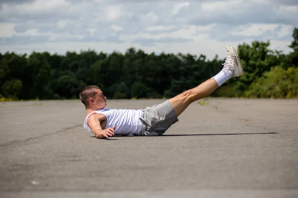 Nineteen Year Old Teenage Boy Doing Leg Raises Public Park — Stock Fotó