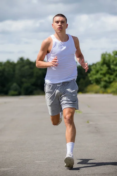 Nineteen Year Old Teenage Boy Jogging Public Park — Stok fotoğraf