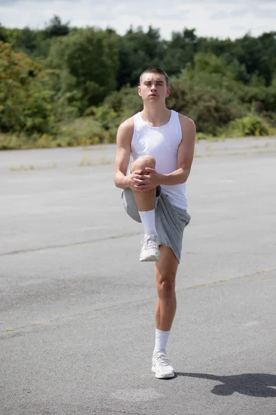 Nineteen Year Old Teenage Boy Stretching Public Park — Stock Fotó