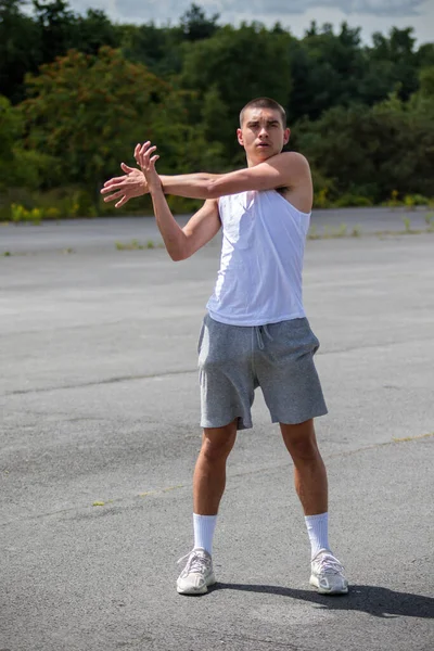 Nineteen Year Old Teenage Boy Stretching Public Park — Stockfoto