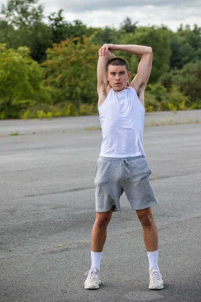 Nineteen Year Old Teenage Boy Stretching Public Park — Stock Fotó