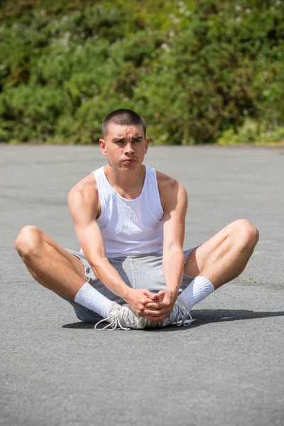 Nineteen Year Old Teenage Boy Stretching Public Park — Stock Fotó