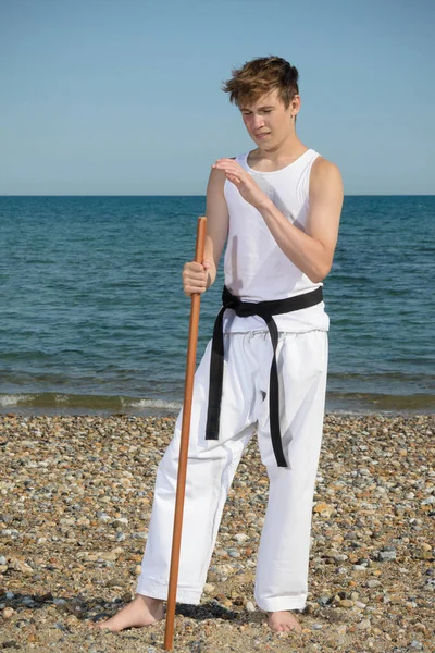 Year Old Teenage Black Belt Staff Beach — Stockfoto