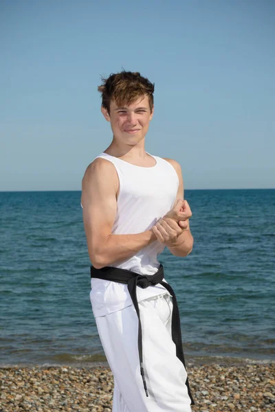 Year Old Teenage Black Belt Flexing His Muscles Beach — Fotografia de Stock
