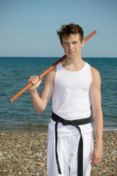 Year Old Teenage Black Belt Staff Beach — Stockfoto