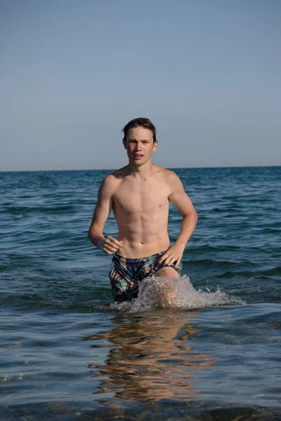 Year Old Teenage Boy Walking Out Sea — Stok Foto