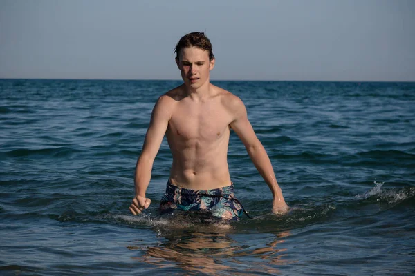 Year Old Teenage Boy Walking Out Sea — Foto de Stock