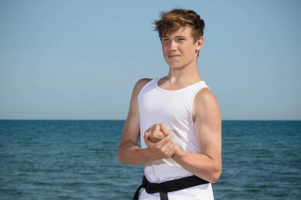 Year Old Teenage Black Belt Flexing His Muscles Beach — Stock fotografie